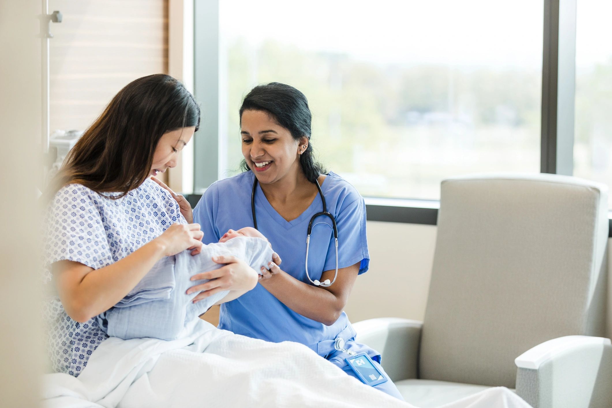 Lactation support consultation with a new mother and baby