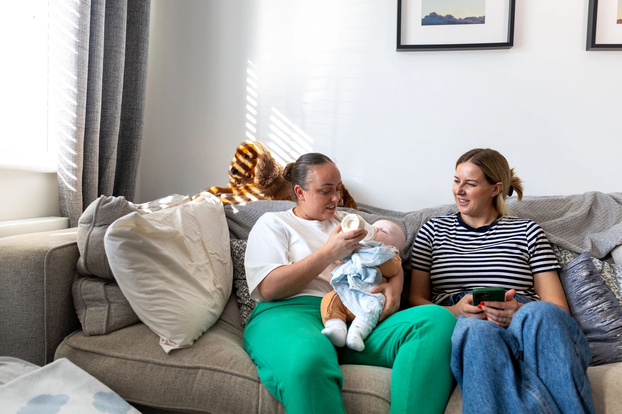 Parents sharing a supportive moment with their baby